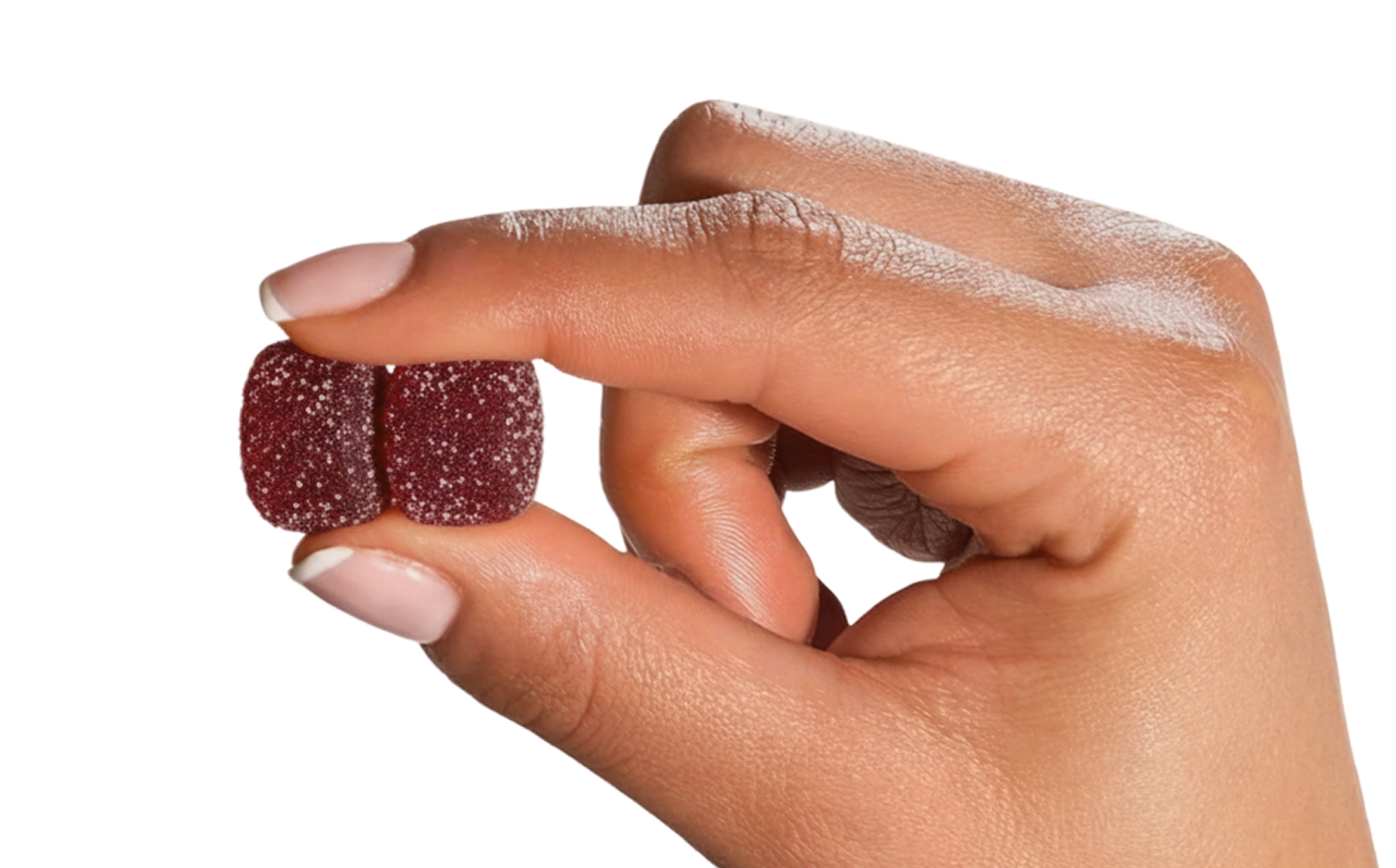 Hand holding two red gummy bears against a white background