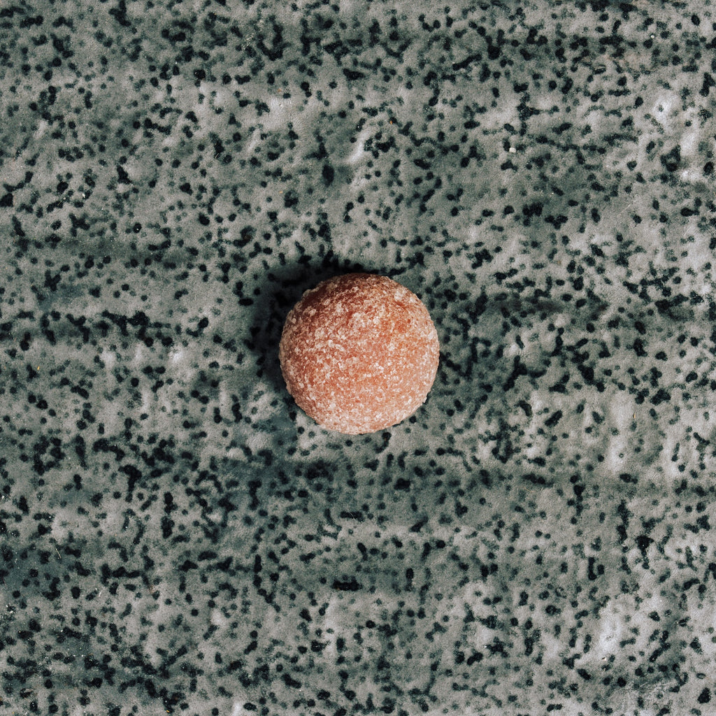 ELK Gummy on a textured gray surface
